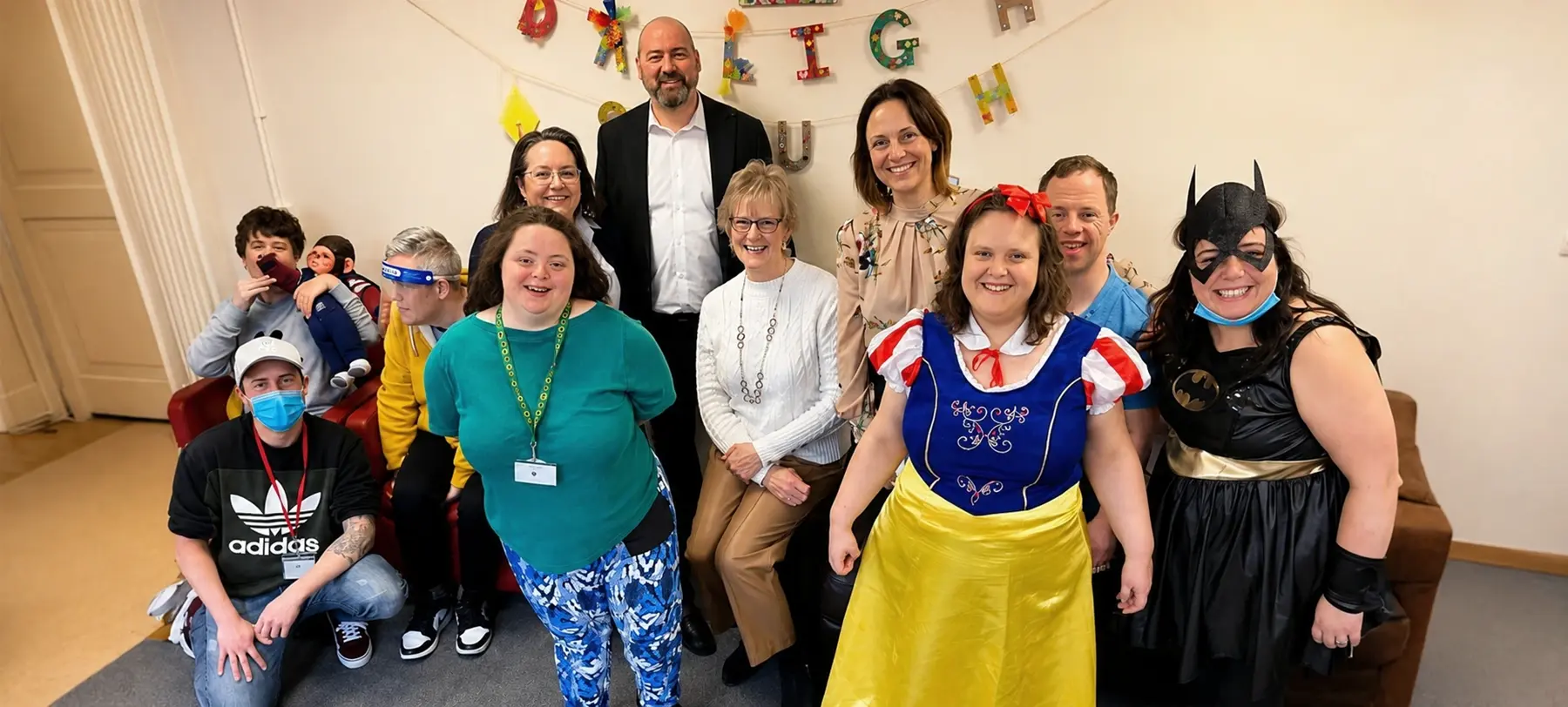 A group of people having fun and wearing fancy dress costumes