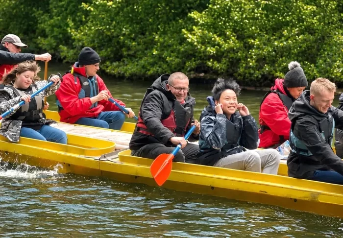Children in a yellow canoe