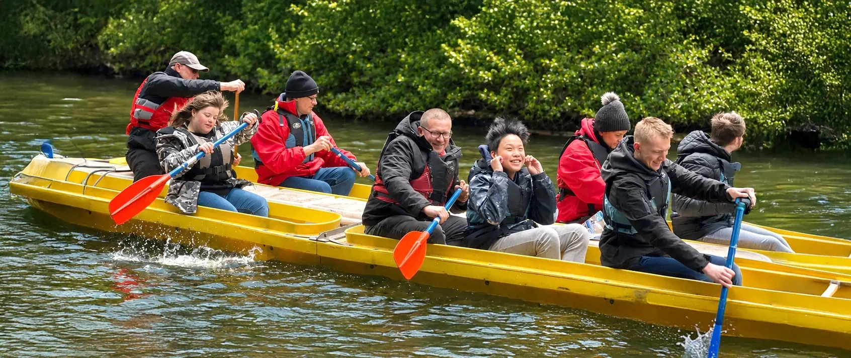 Children in a yellow canoe