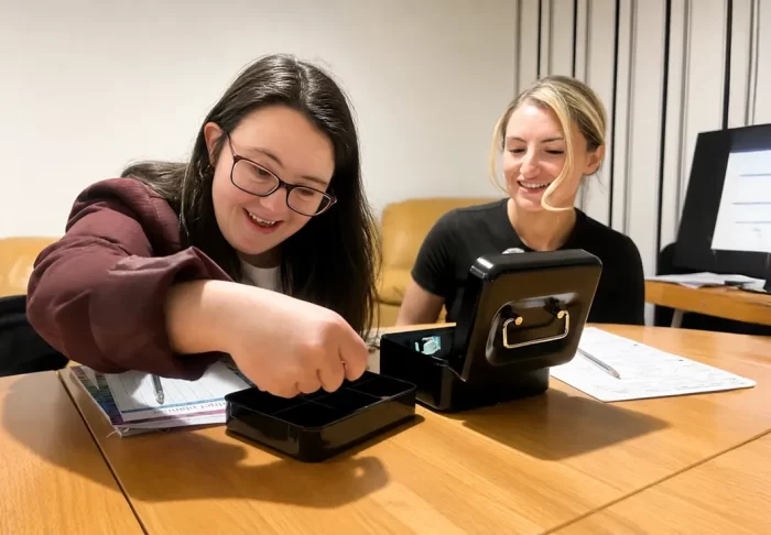 A Service User learning how to manage her weekly finances