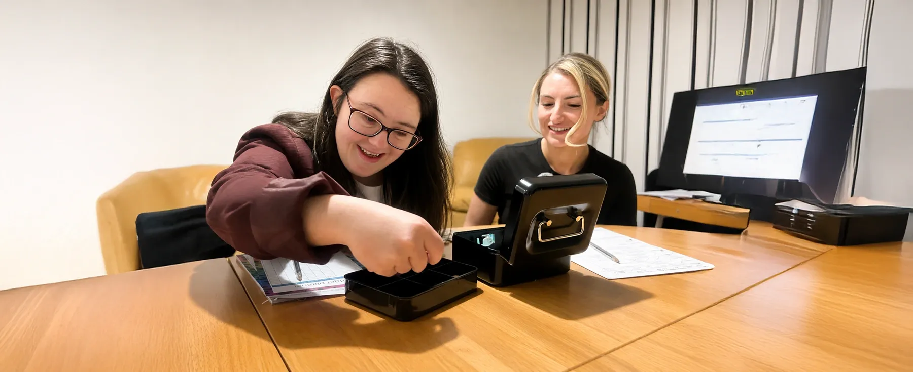 A Service User learning how to manage her weekly finances
